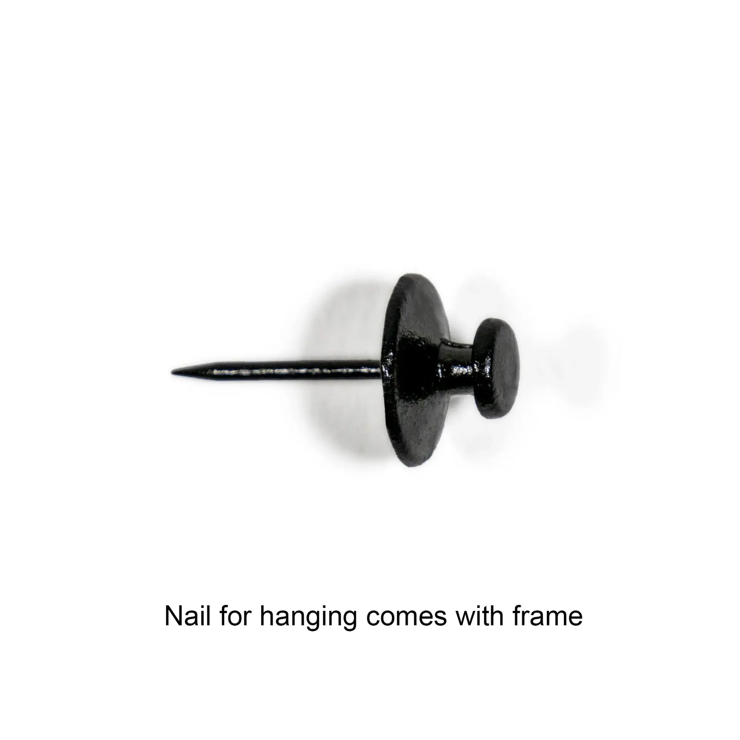 Black nail for hanging on a white background with text 'Nail for hanging comes with frame'.