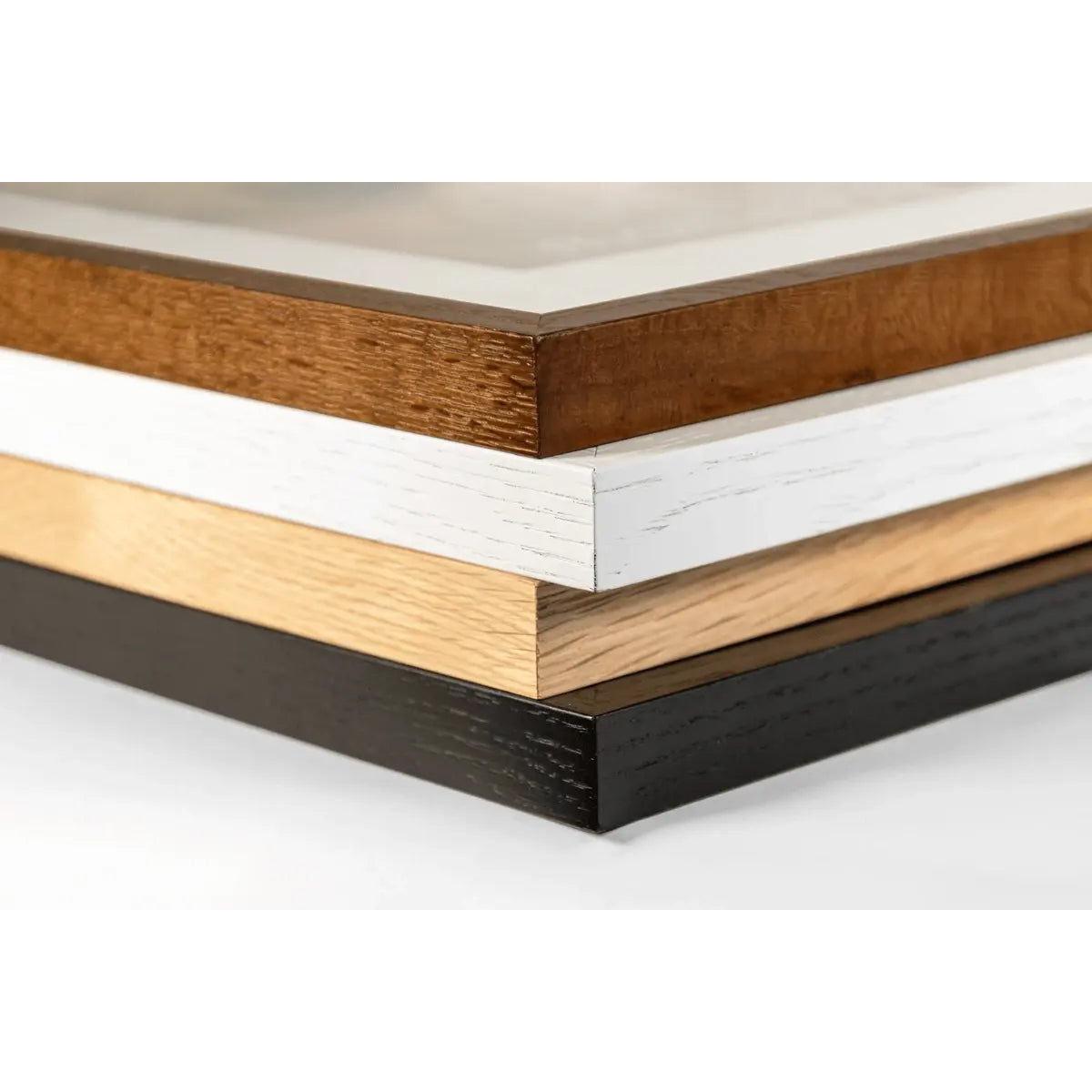 Close-up of different wood finish samples on a white background