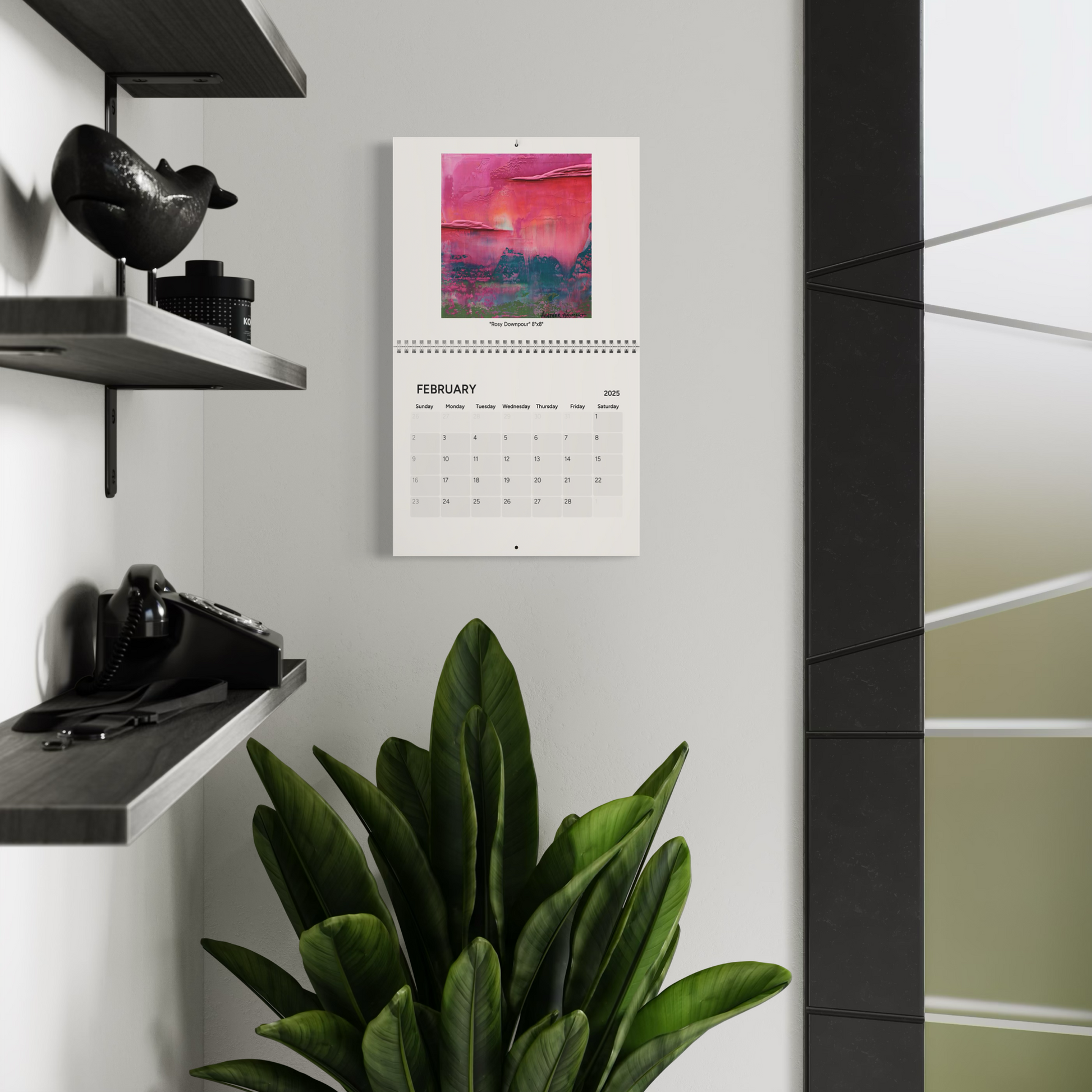 2025 Art Calendar - February on wall with plant