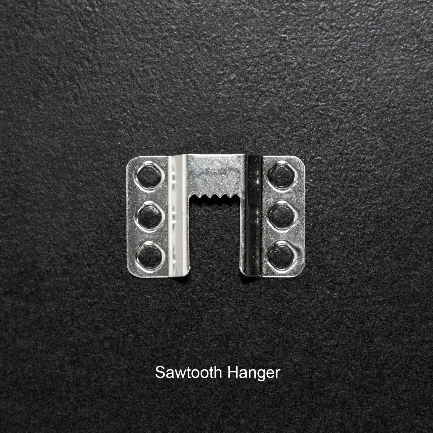 Sawtooth hanger on a black background with 'Sawtooth Hanger' text below.