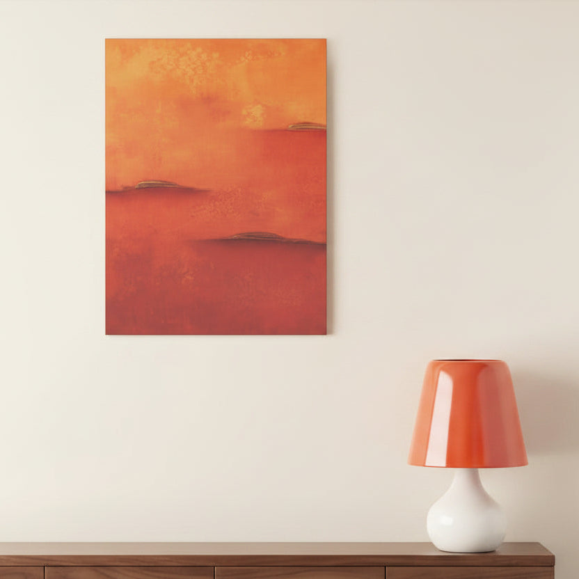 Orange abstract canvas art print on a wall above a shelf with decor items