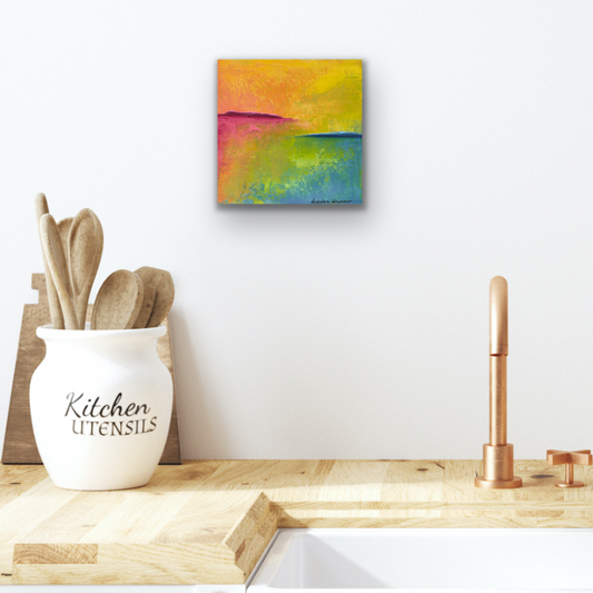 Daydreamy art on the wall over a copper sink