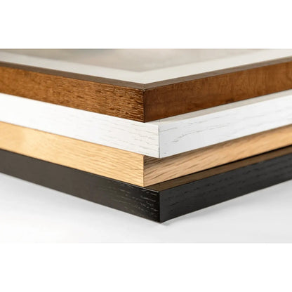 Close-up of different wood finish samples on a white background