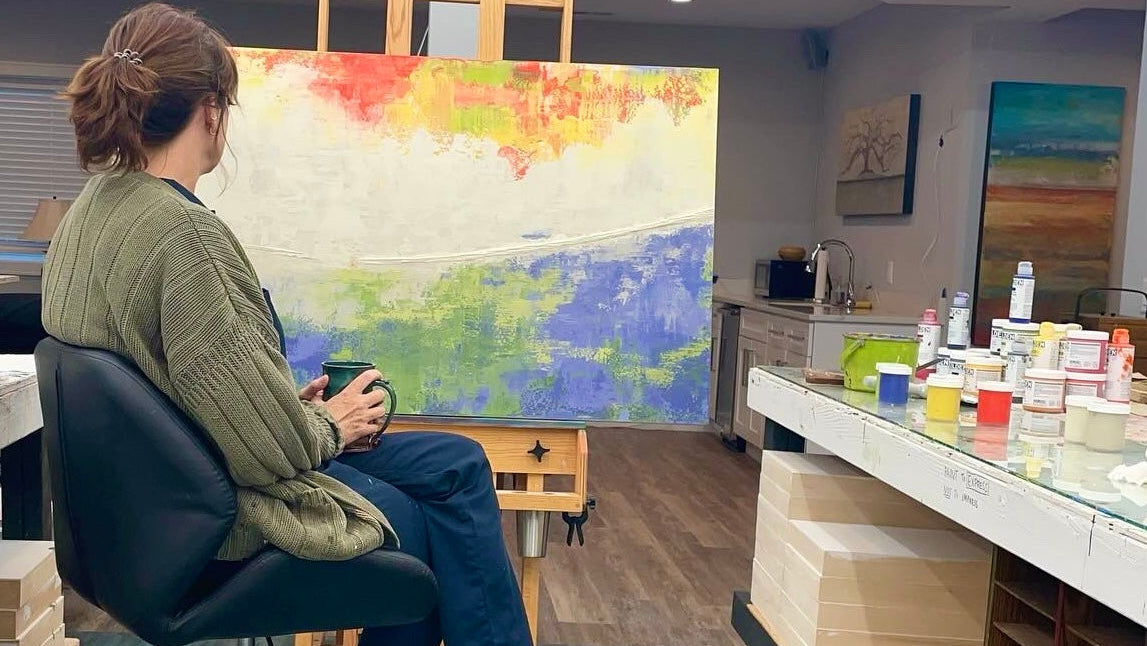 Heather Haymart - the artist contemplating her painting