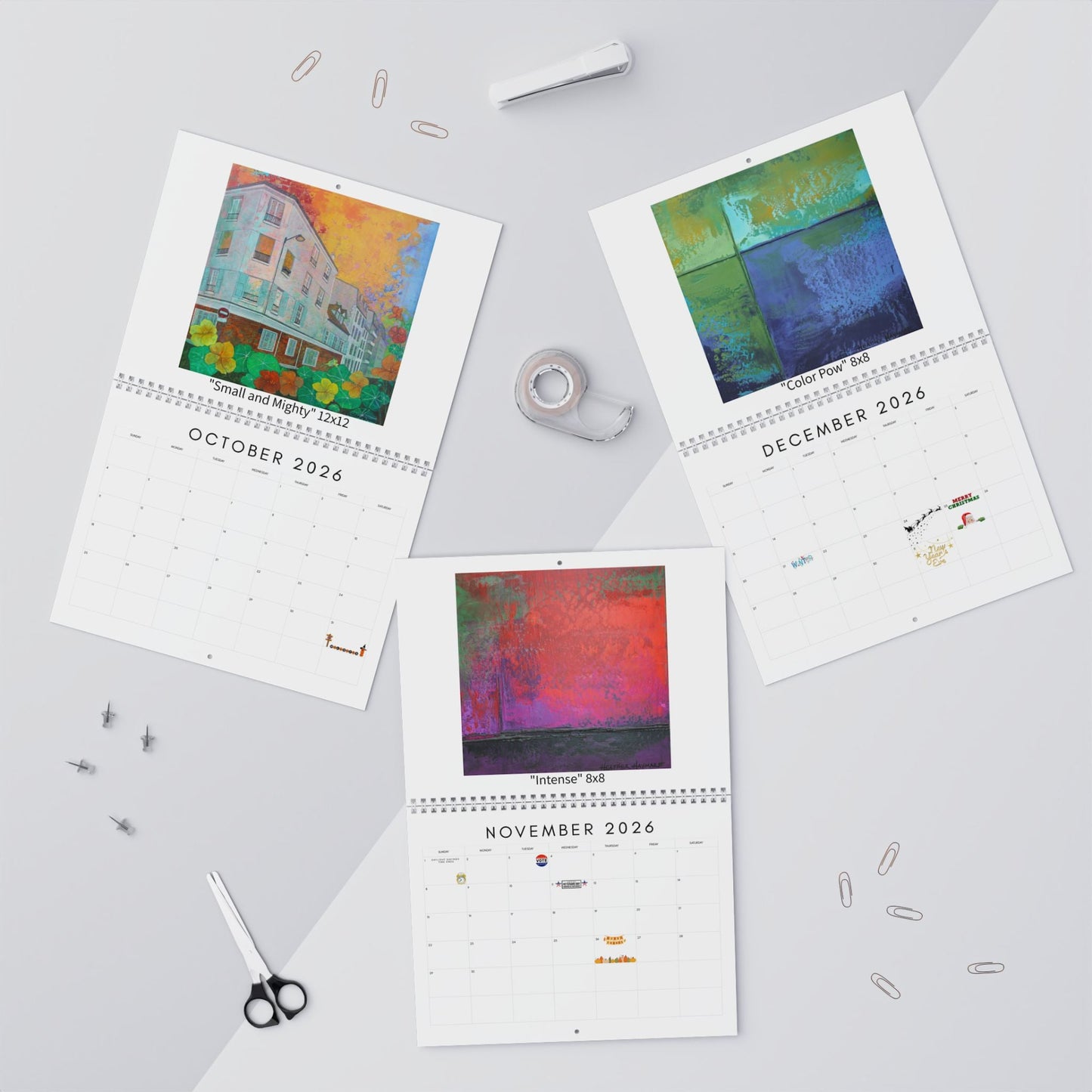 Three calendar pages for October, November, and December 2026 on a light gray background with stationery items.