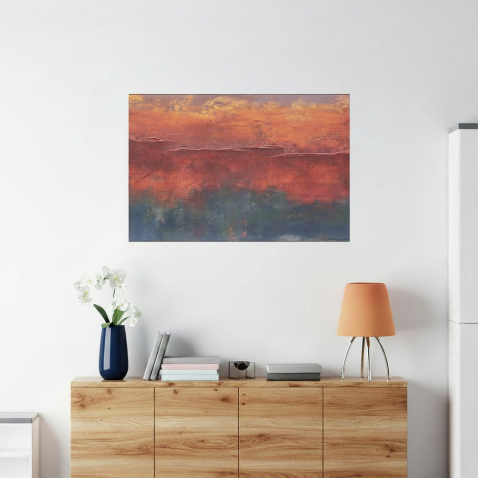 Abstract art print on a wall above a wooden cabinet with decorative items.
