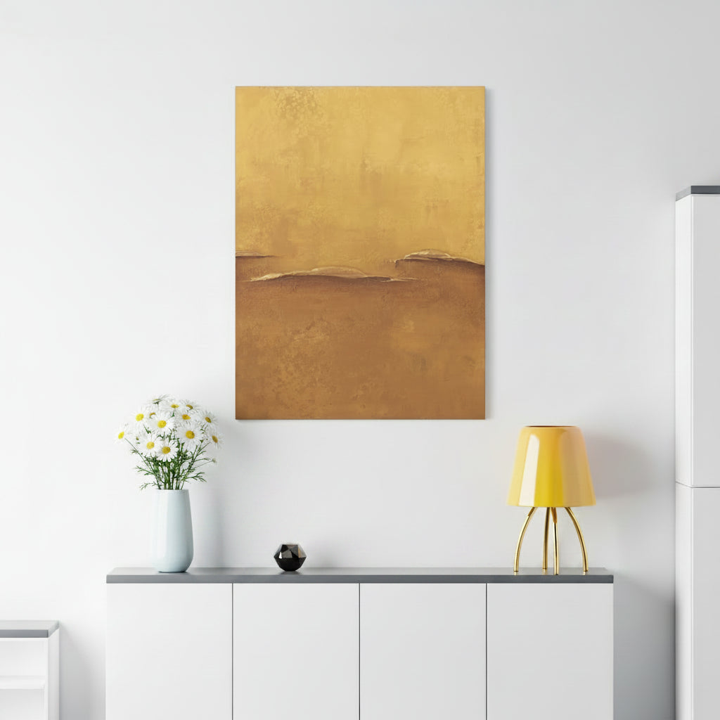 Abstract canvas art print gold painting on a white wall above a white cabinet with decorative items.