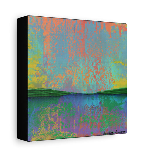 A square abstract landscape-style wall art print or canvas shown at a slight angle, with a black side edge and a white background. The artwork contains blended areas of turquoise, coral, yellow, green, blue, purple, and pink, with darker green landforms near the bottom.