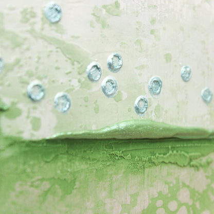 detail of wall art with shades of green, gray and duck egg blue