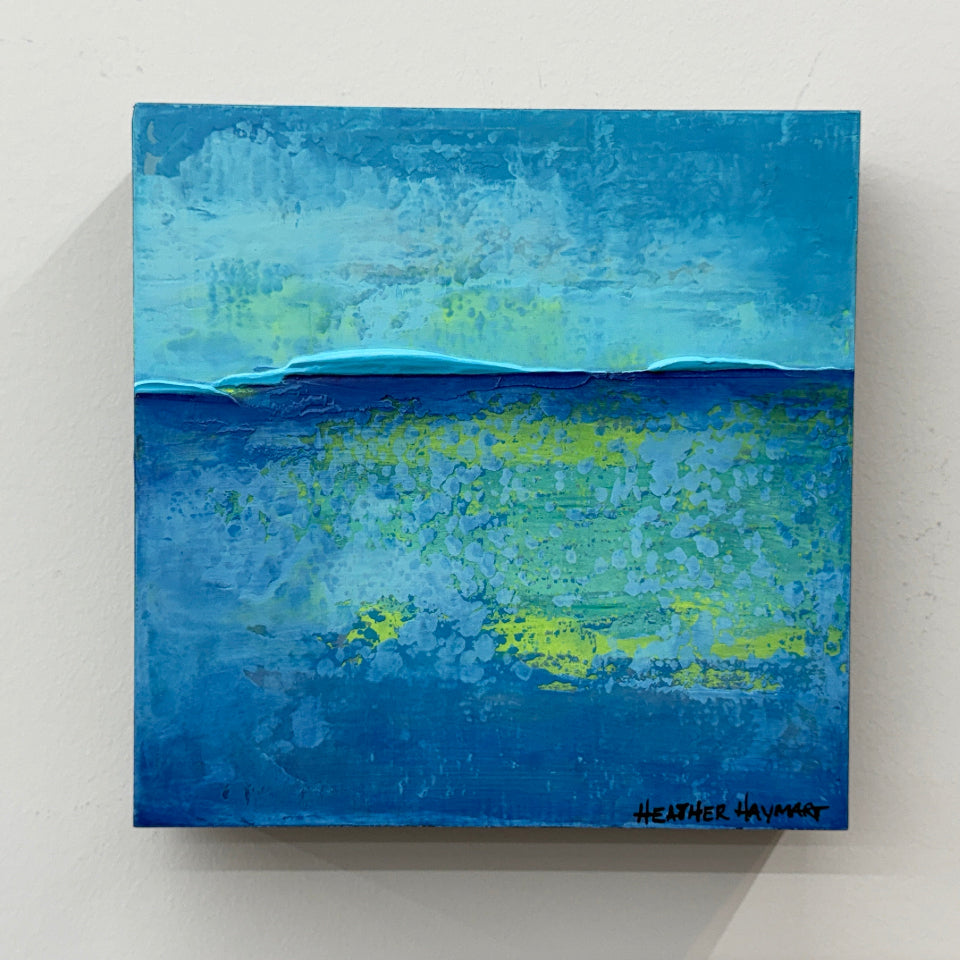 Abstract painting with ocean blue and green hues on a light gray background