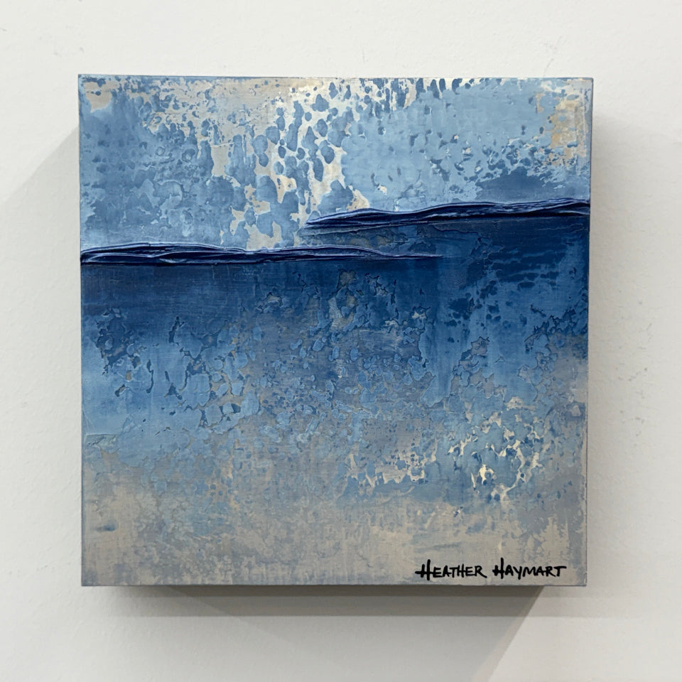 Abstract art by Heather Haymart with blue and gray tones on a white background