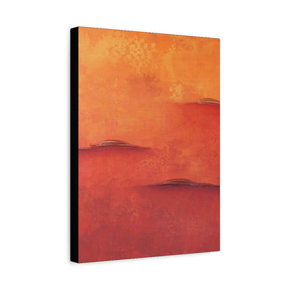 Abstract canvas art print with warm orange and red tones on a white background side view